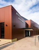 Kingspan Evolution insulated panels made from COLORBOND® Metallic steel in the colour Aries® help protect the building from heat load