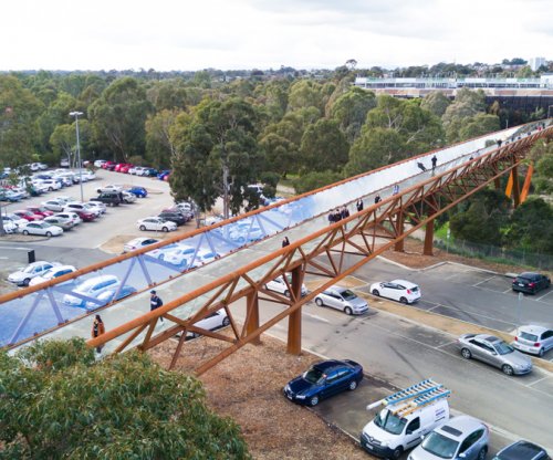 The new Deakin University Burwood pedestrian bridge uses REDCOR® weathering steel to deliver a practical, paint-free structure requiring minimal maintenance compared with conventional structural steel.